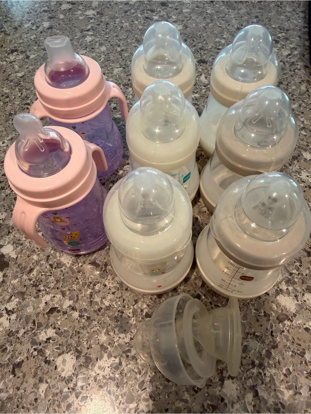 Mam bottle & transition sippy set. Very gently used as my baby was mostly EBF.